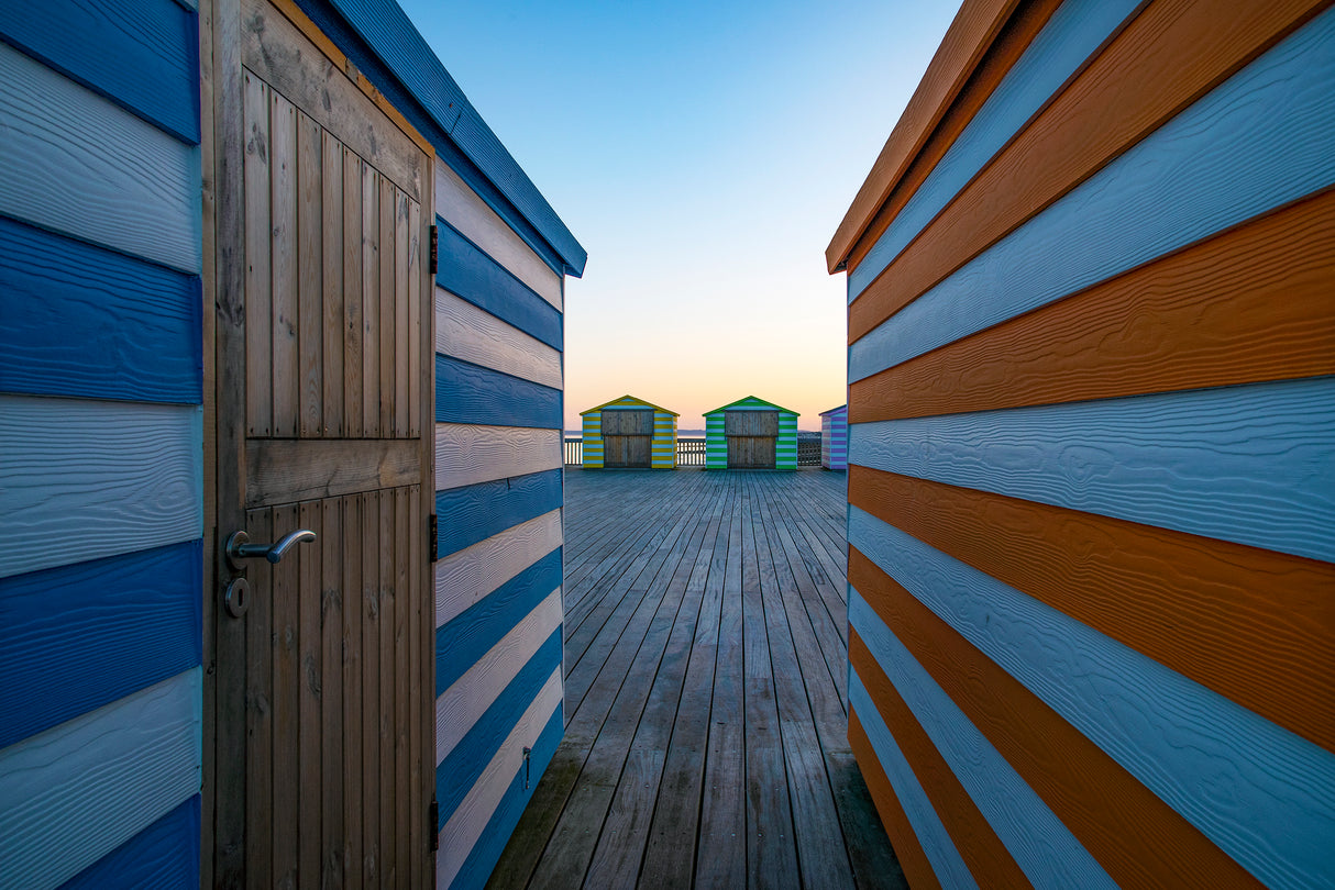 Beach huts on the pier Poster och Canvastavla