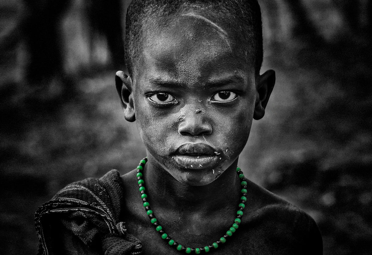 Surmi boy with a green necklace Poster och Canvastavla