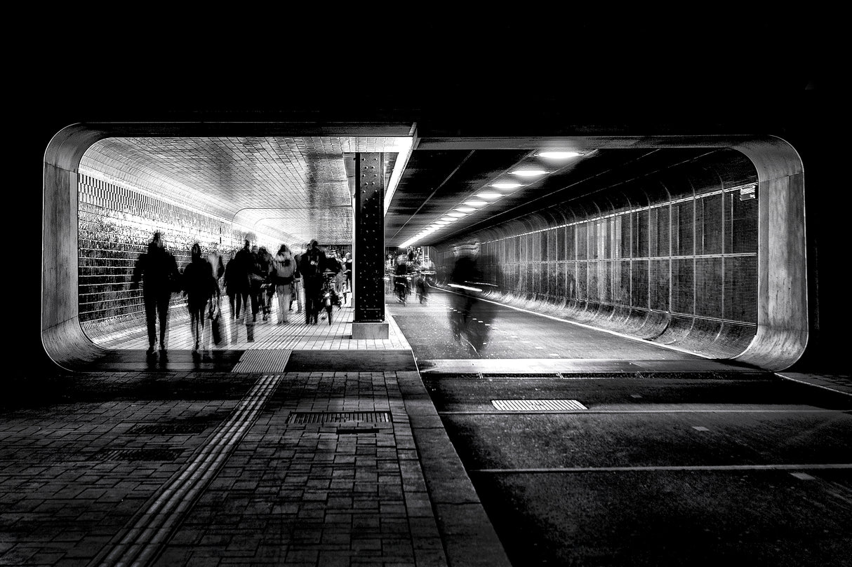 Hasty people on a Friday evening in the tunnel. Poster och Canvastavla