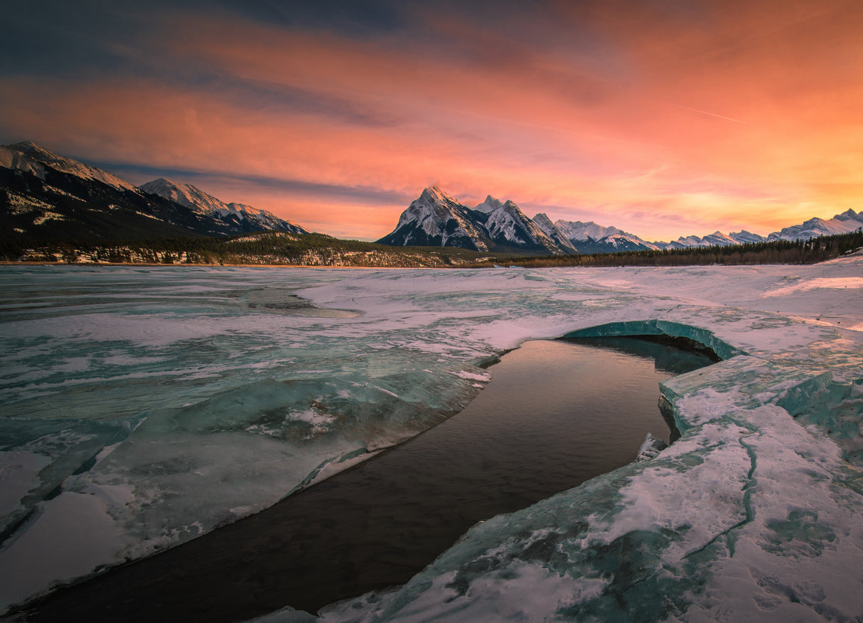 The sunset at a spring thawing lake Poster och Canvastavla