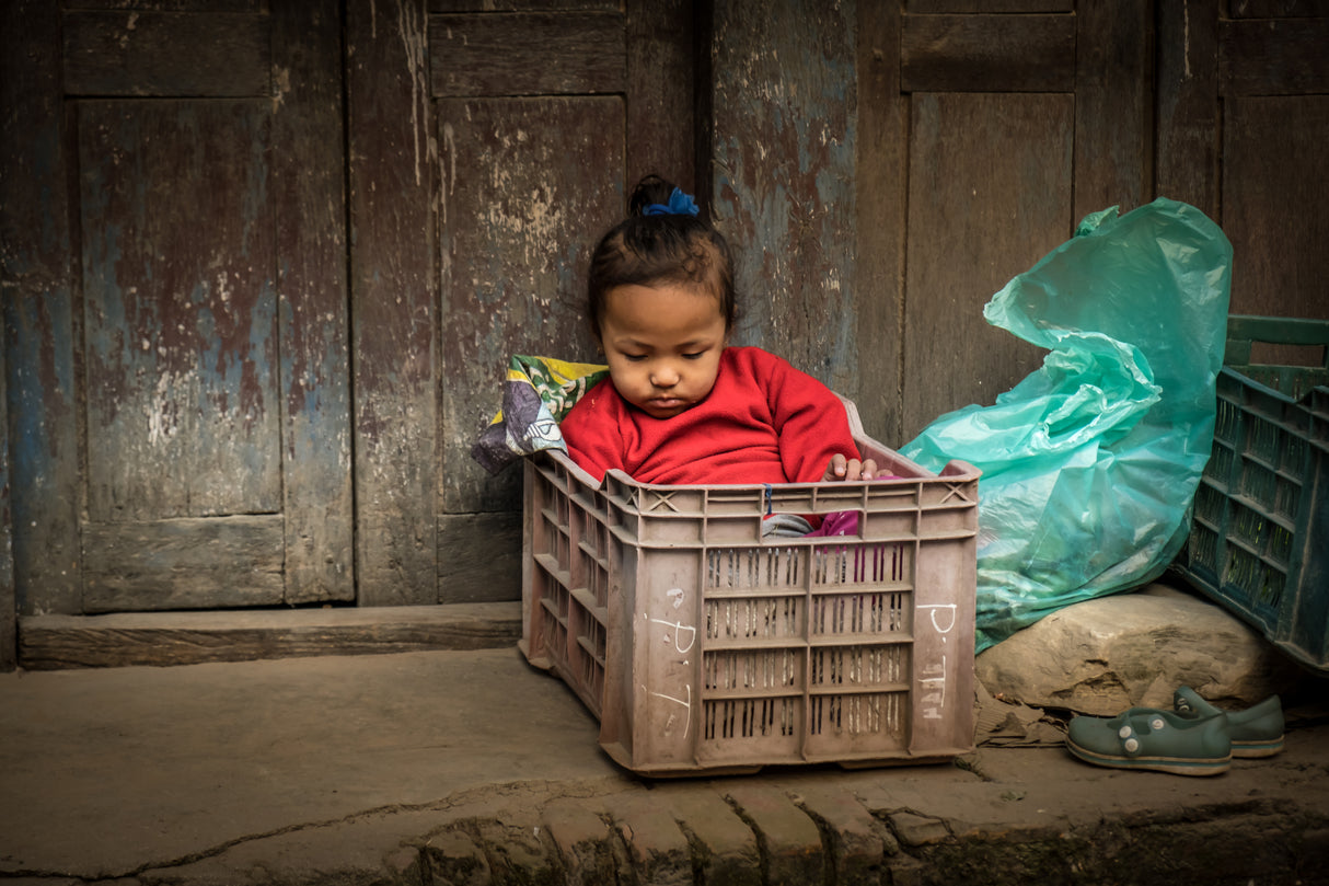 Babysitting in the market at Bhaktapur, Nepal Poster och Canvastavla