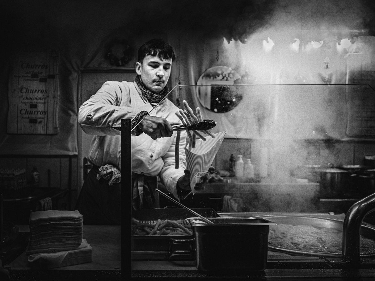 Churros stand with steam at night Poster och Canvastavla