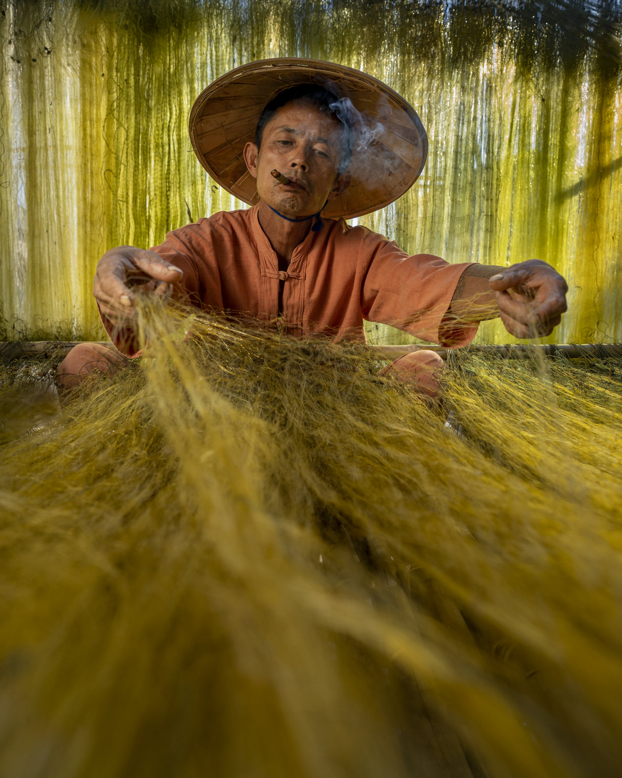 A fisherman preparing his nets ready for the next Catch Poster och Canvastavla