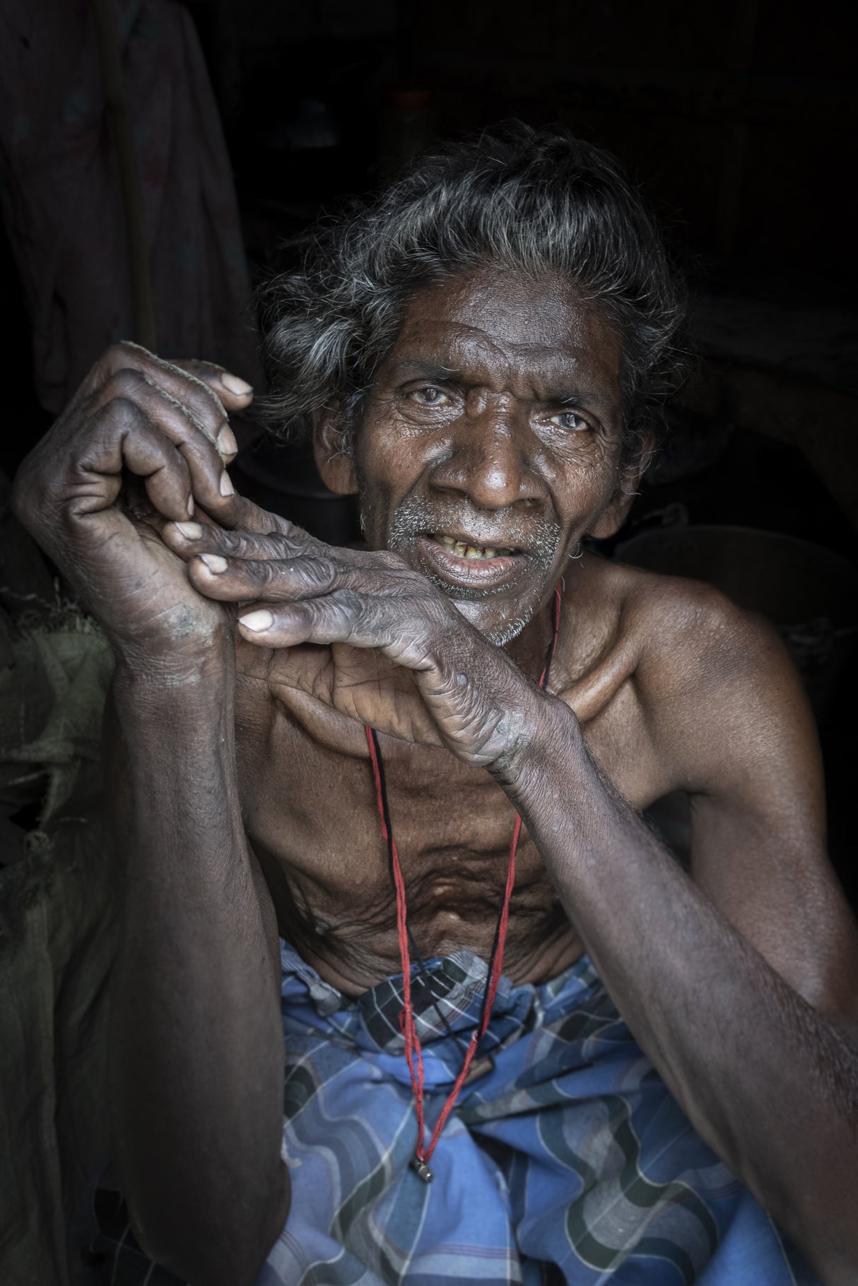 elder in a village at the outskirts of Kolkata, India Poster och Canvastavla