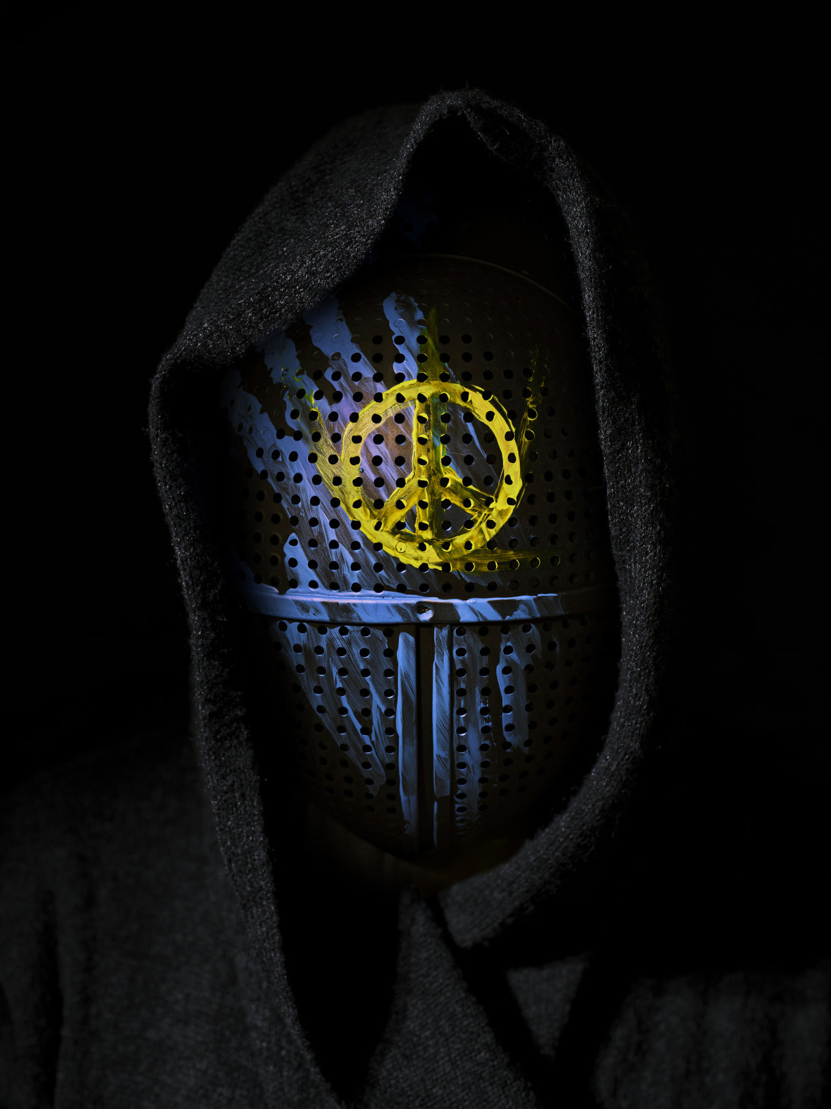 a mask painted in the colors of the Ukrainian flag Poster och Canvastavla