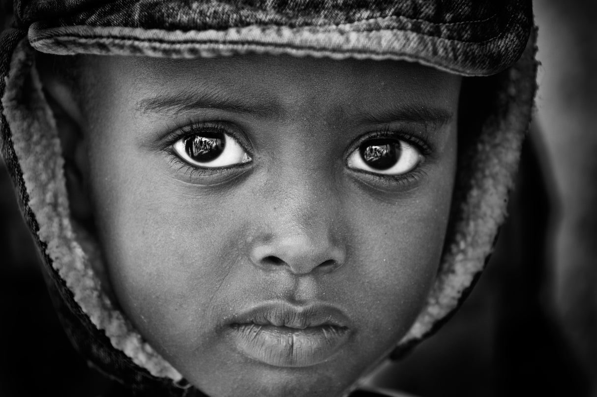 A boy, a cap Poster och Canvastavla