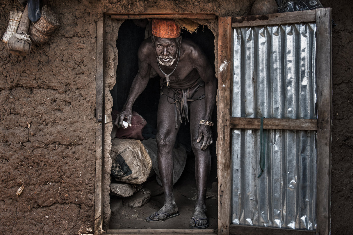 The village chief leaving his home - Benin Poster och Canvastavla