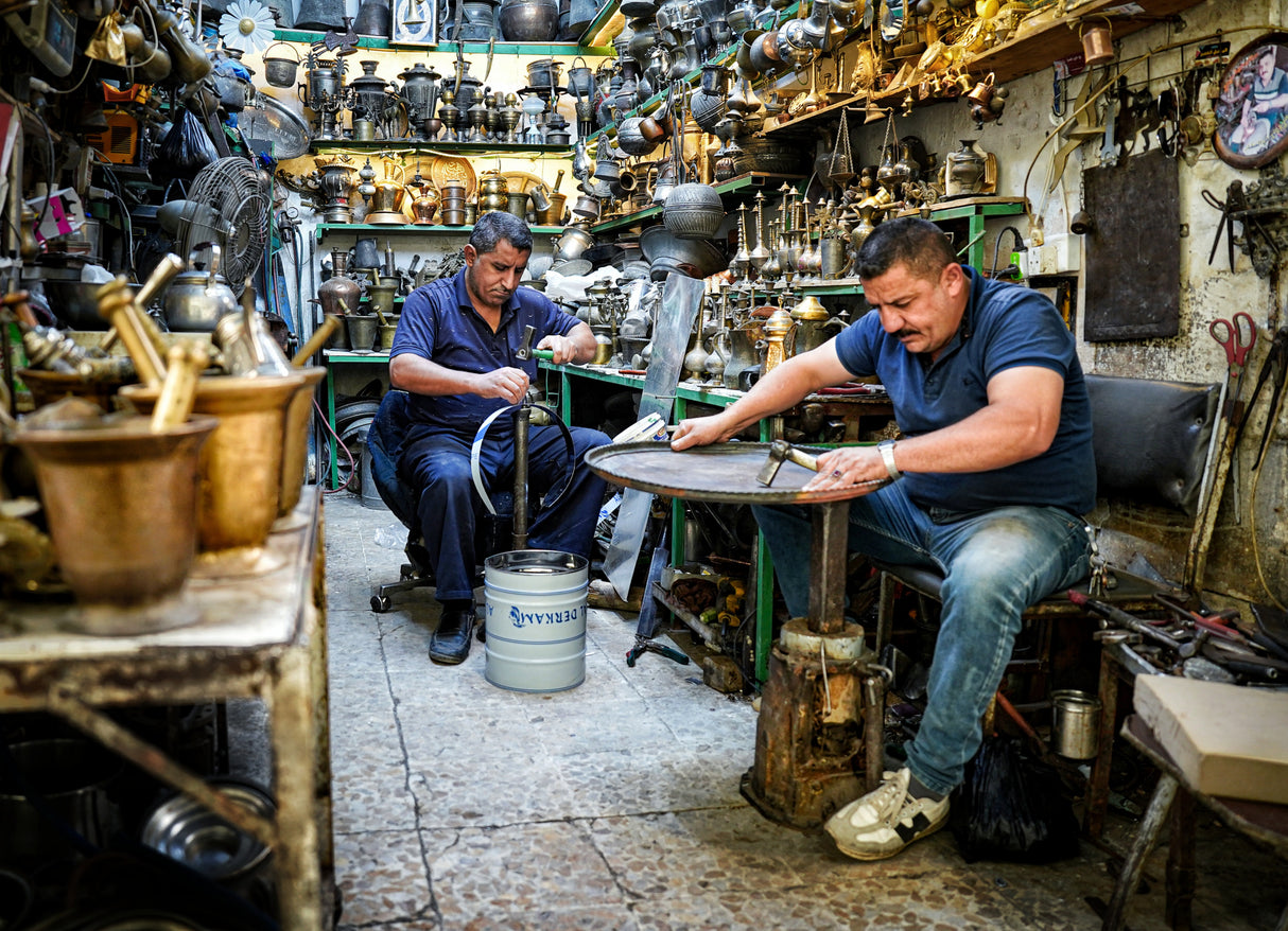 The traditional coppersmith profession in the city of Mosul Poster och Canvastavla