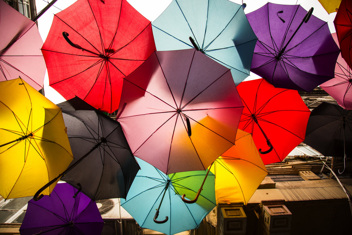 old building and decorative umbrellas Poster och Canvastavla