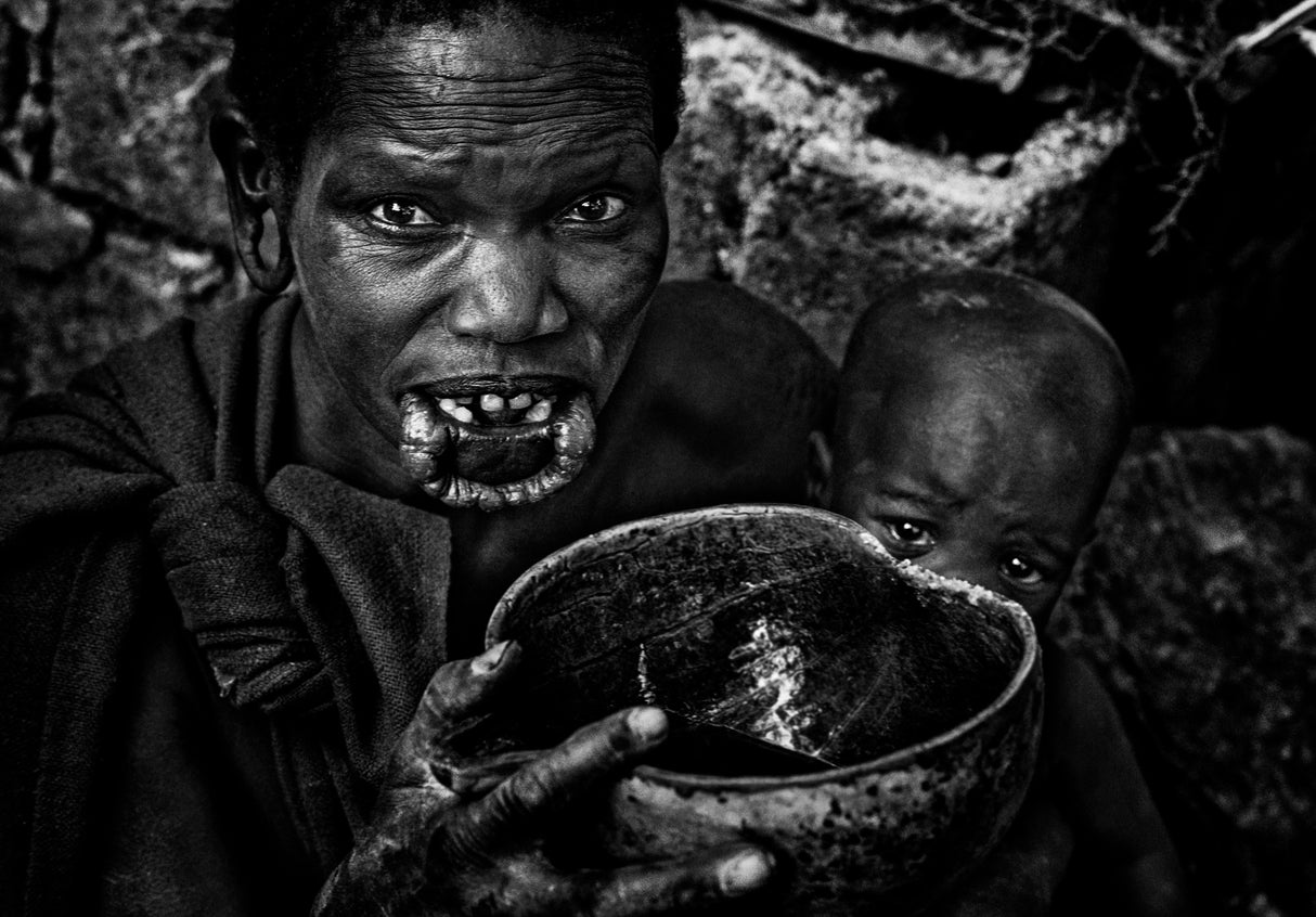 Surma woman drinking coffee. Poster och Canvastavla