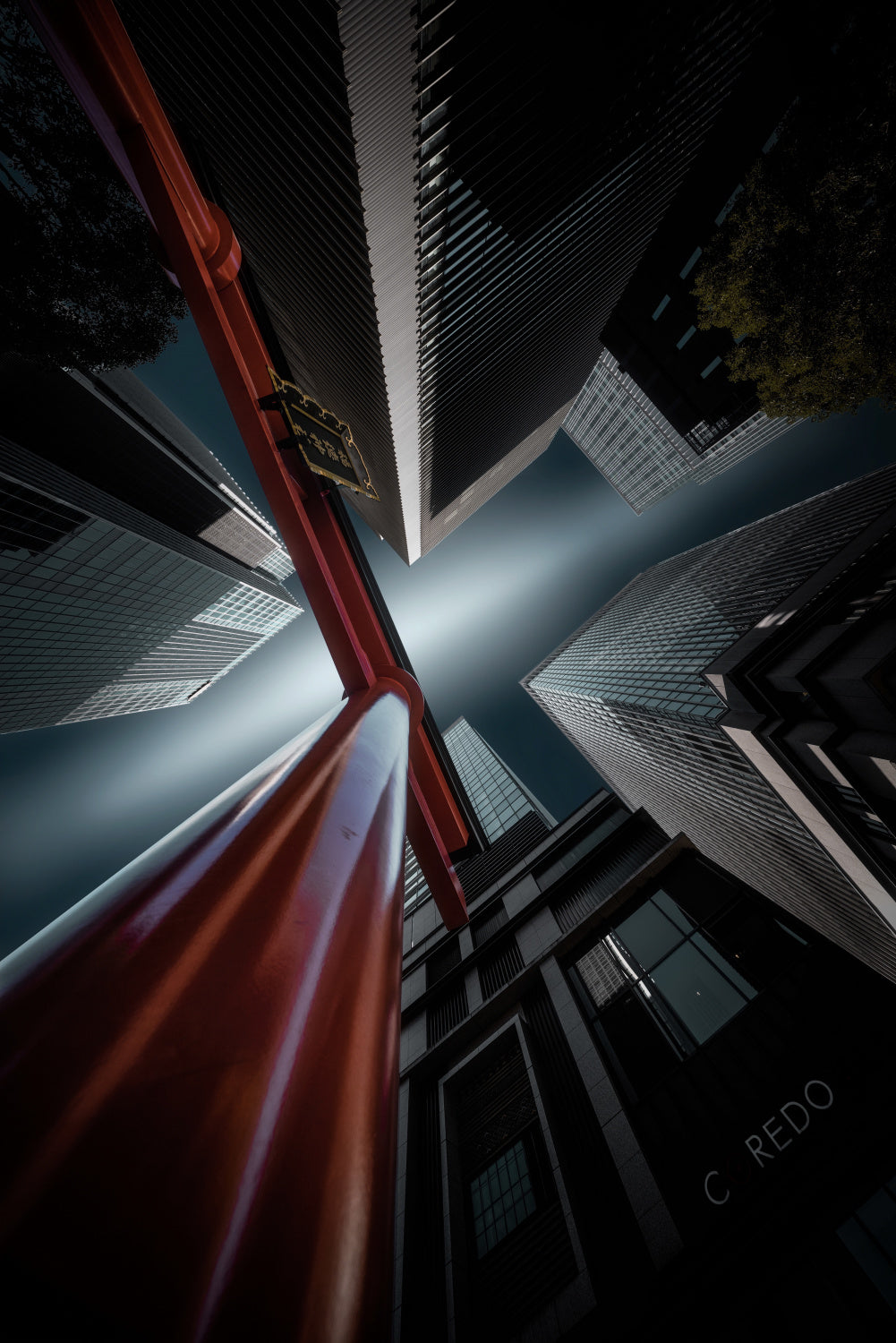 Torii gate flanked by buildings Poster och Canvastavla