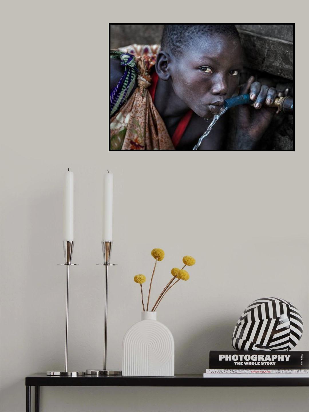 Surmi tribe girl drinking water from a tap - Ethiopia Poster och Canvastavla