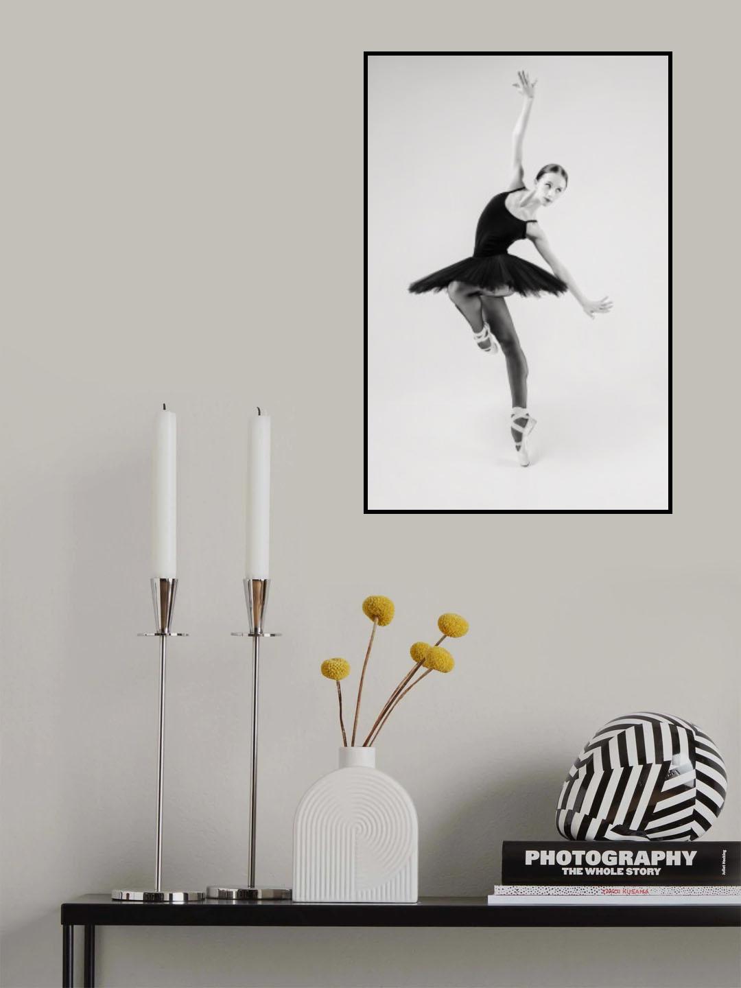 black swan. ballerina in a black tutu shows elements of ballet dance in motion Poster och Canvastavla