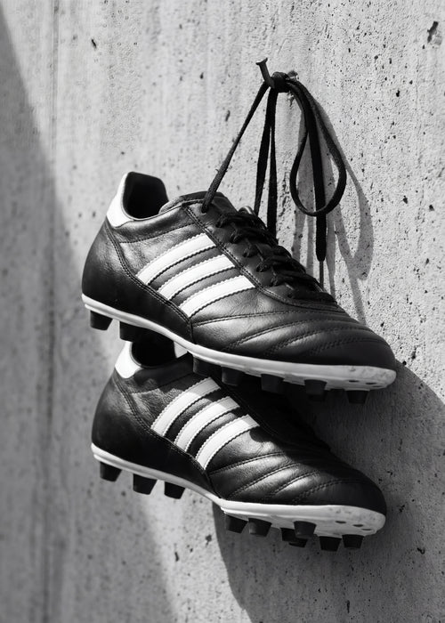 Hanging Soccer Cleats Poster