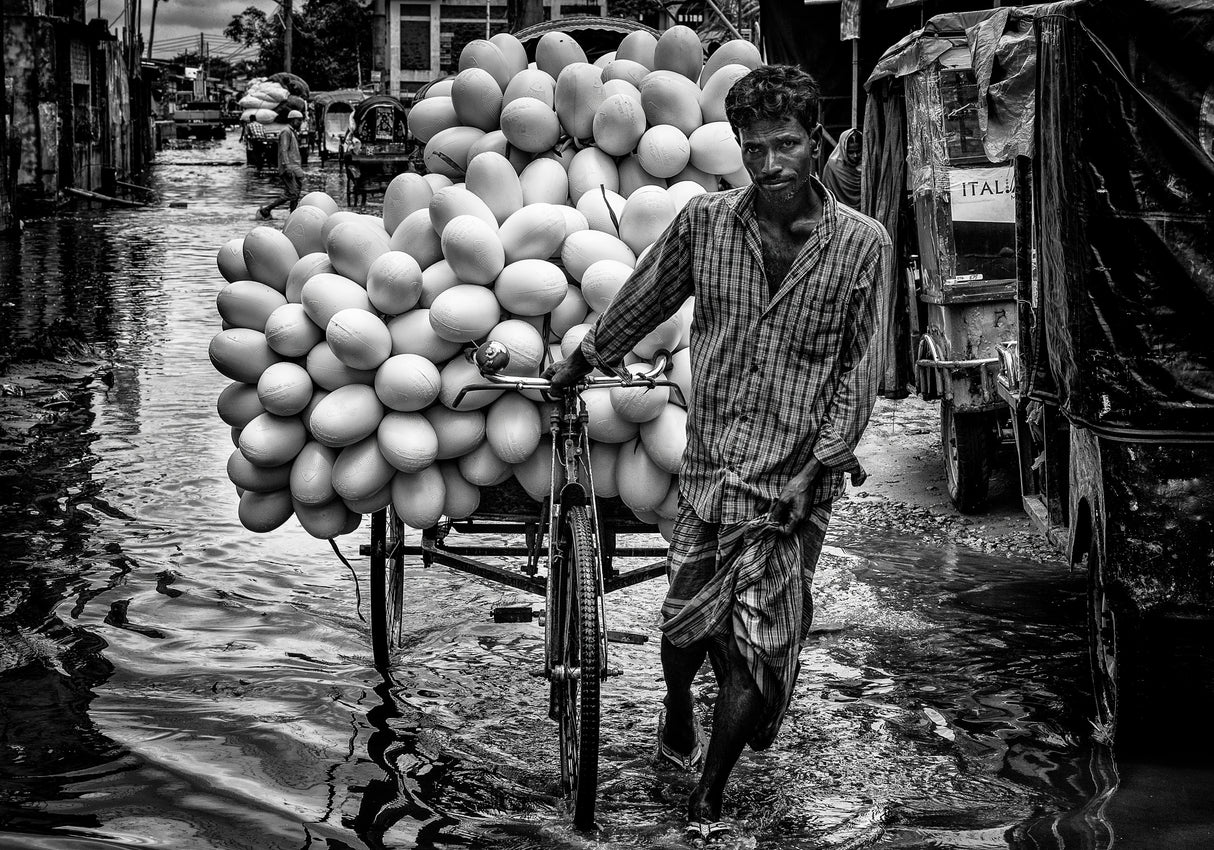 Carrying goods through flooded streets in Bangladesh Poster och Canvastavla