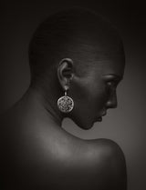 Model with an earring Poster och Canvastavla