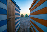 Beach huts on the pier Poster och Canvastavla