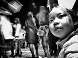 A girl crouching at night Poster och Canvastavla
