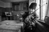 The violonist of the village Poster och Canvastavla