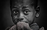 Ethiopian child at a religious ceremony. Poster och Canvastavla