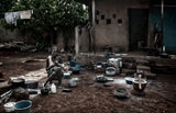 Woman preparing food - Ivory Coast. Poster och Canvastavla