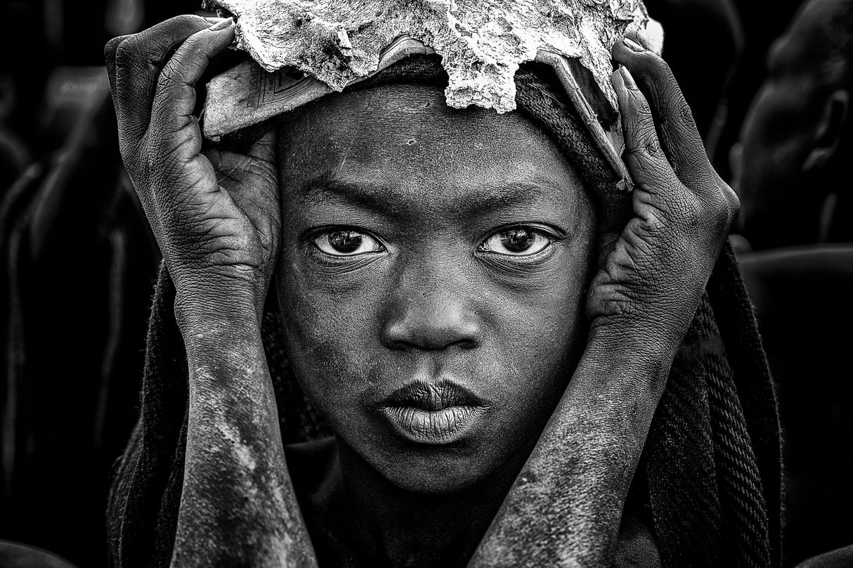 Surmi tribe child with an animal bone in his head. Poster och Canvastavla