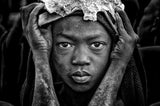 Surmi tribe child with an animal bone in his head. Poster och Canvastavla