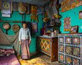 Woman in her living room, Bhutan. Poster och Canvastavla