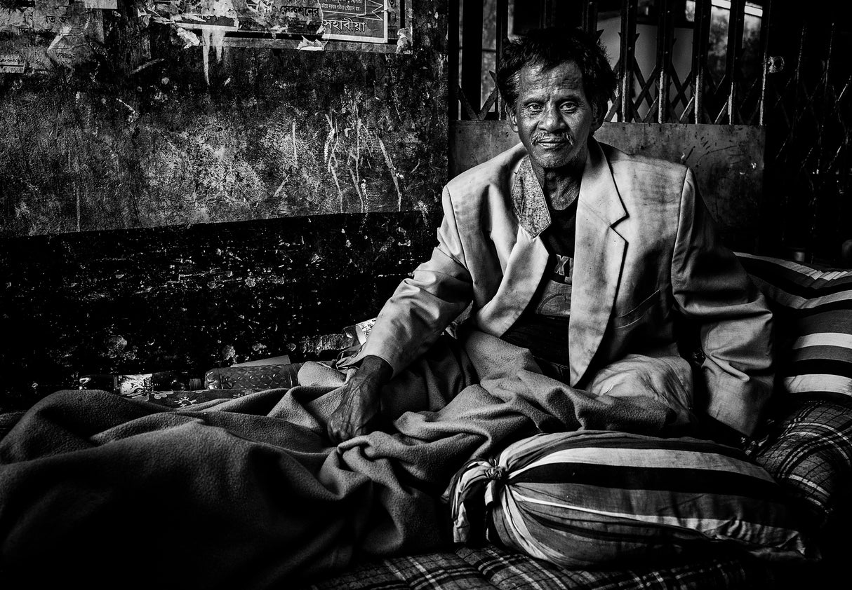 Lying in bed in a street of Bangladesh. Poster och Canvastavla
