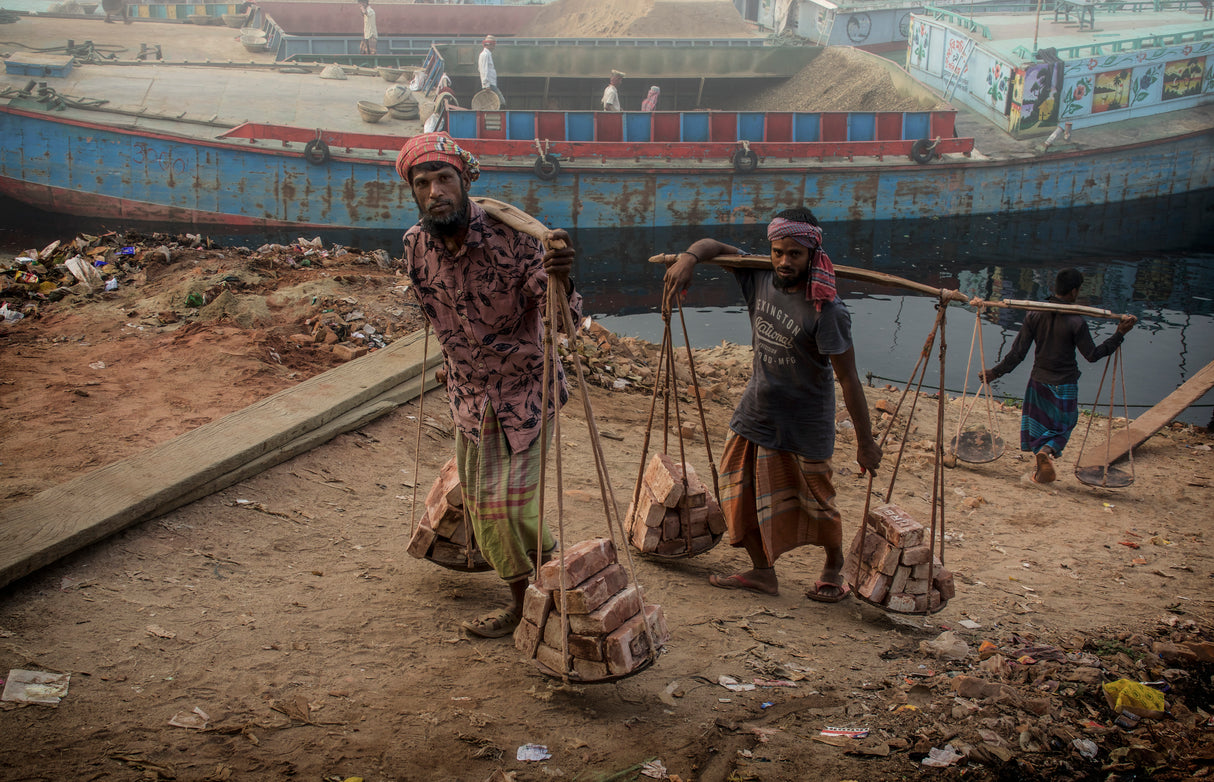 brick transporters at Buriganga river bank Poster och Canvastavla