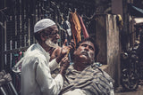 Street barber of Jaipur lake Poster och Canvastavla