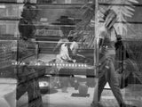 Street artist reflected in the shop window Poster och Canvastavla