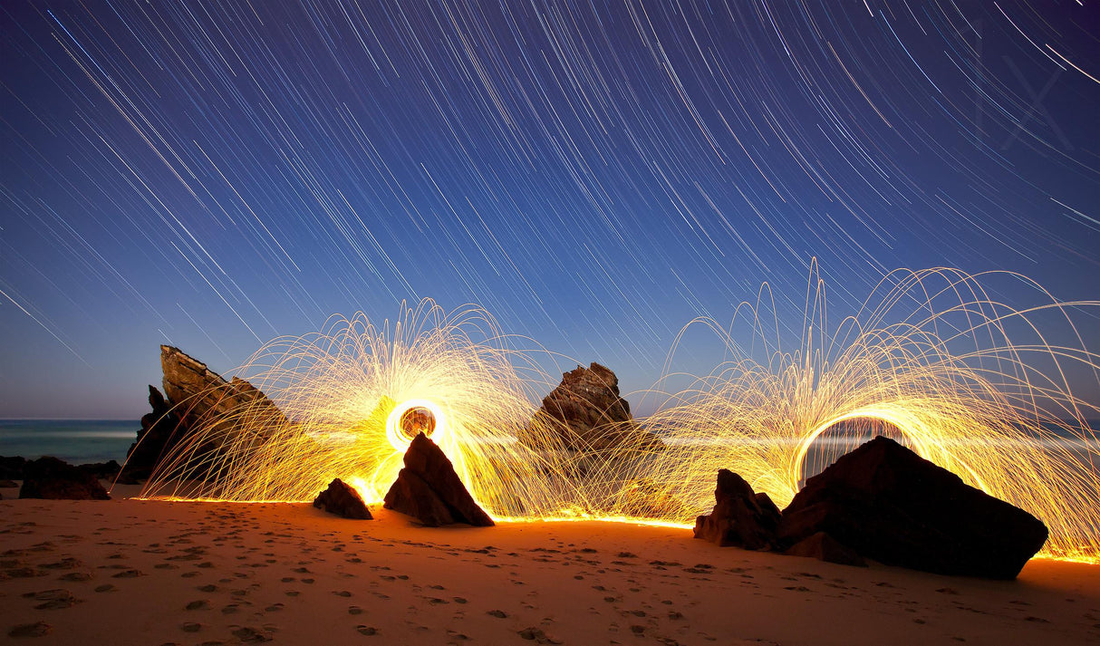 Fire in Star trails Poster och Canvastavla