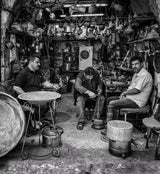 The traditional coppersmith profession in the city of Mosul Poster och Canvastavla