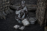 El Molo ethnic woman feeding the chickens Poster och Canvastavla