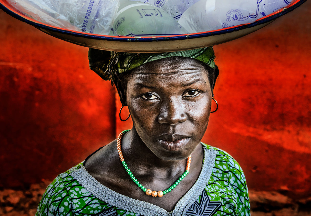 Selling water in a market in Benin. Poster och Canvastavla