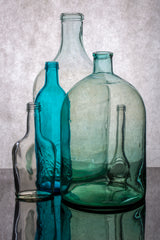 Still life with different transparent glass bottles Poster och Canvastavla