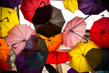 old building and decorative umbrellas Poster och Canvastavla