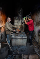 The traditional blacksmithing profession in the city of Mosul Poster och Canvastavla