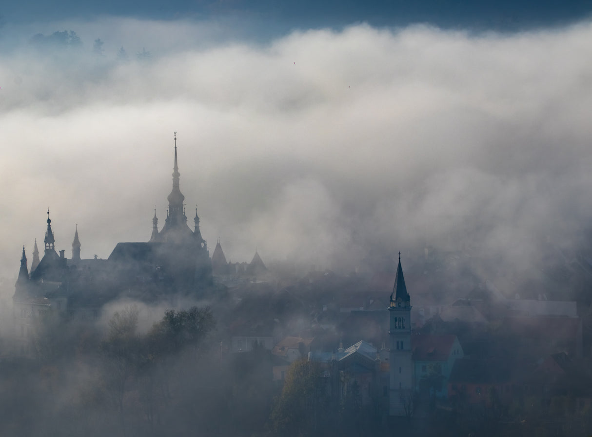 Dense fog over old town Poster och Canvastavla