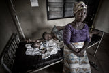A grandmother takes her granddaughter to visit her sick daughter - Ghana Poster och Canvastavla