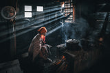 A village granny preparing a meal Poster och Canvastavla