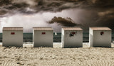 Seashore serenity after a sand battle Poster och Canvastavla