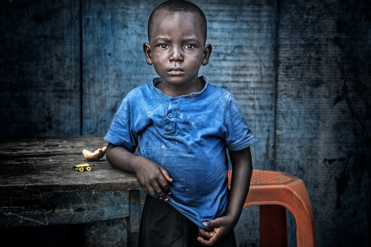 Boy in the streets of Accra - Ghana. Poster och Canvastavla