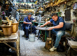 The traditional coppersmith profession in the city of Mosul Poster och Canvastavla