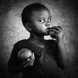 Little girl with pumpkins Poster och Canvastavla