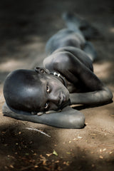 Young Mundari boy at rest Poster och Canvastavla