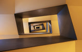 Several geometric forms in shades from yellow to brown of a staircase in Frankfurt Poster och Canvastavla