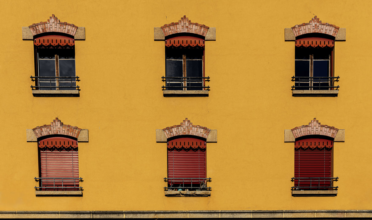 symmetrical windows on a warm background Poster och Canvastavla