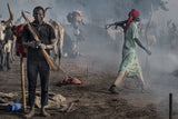 In a Mundari camp some use firearms while others use bows and arrows Poster och Canvastavla